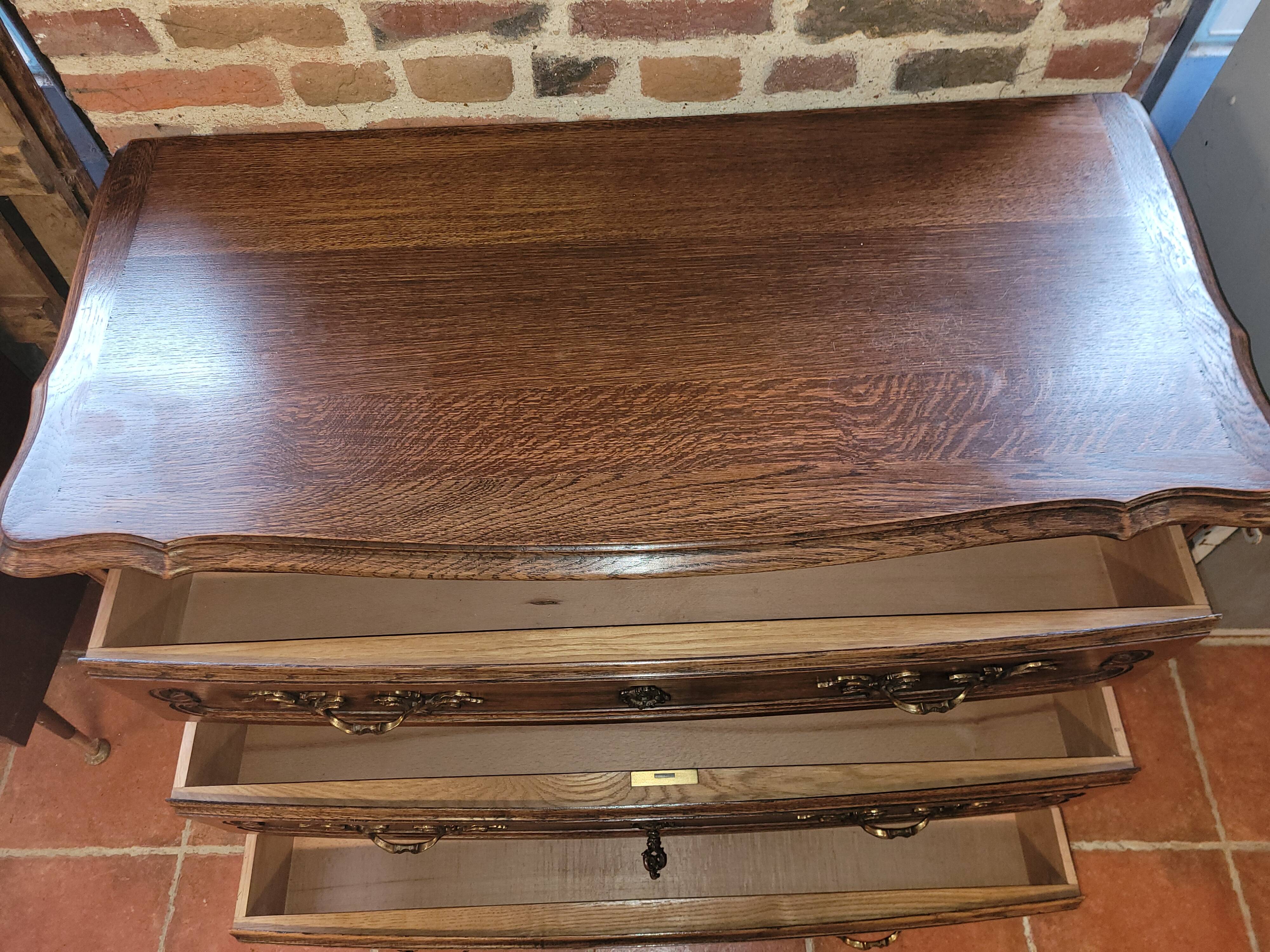 Louis XV style chest of drawers in solid oak