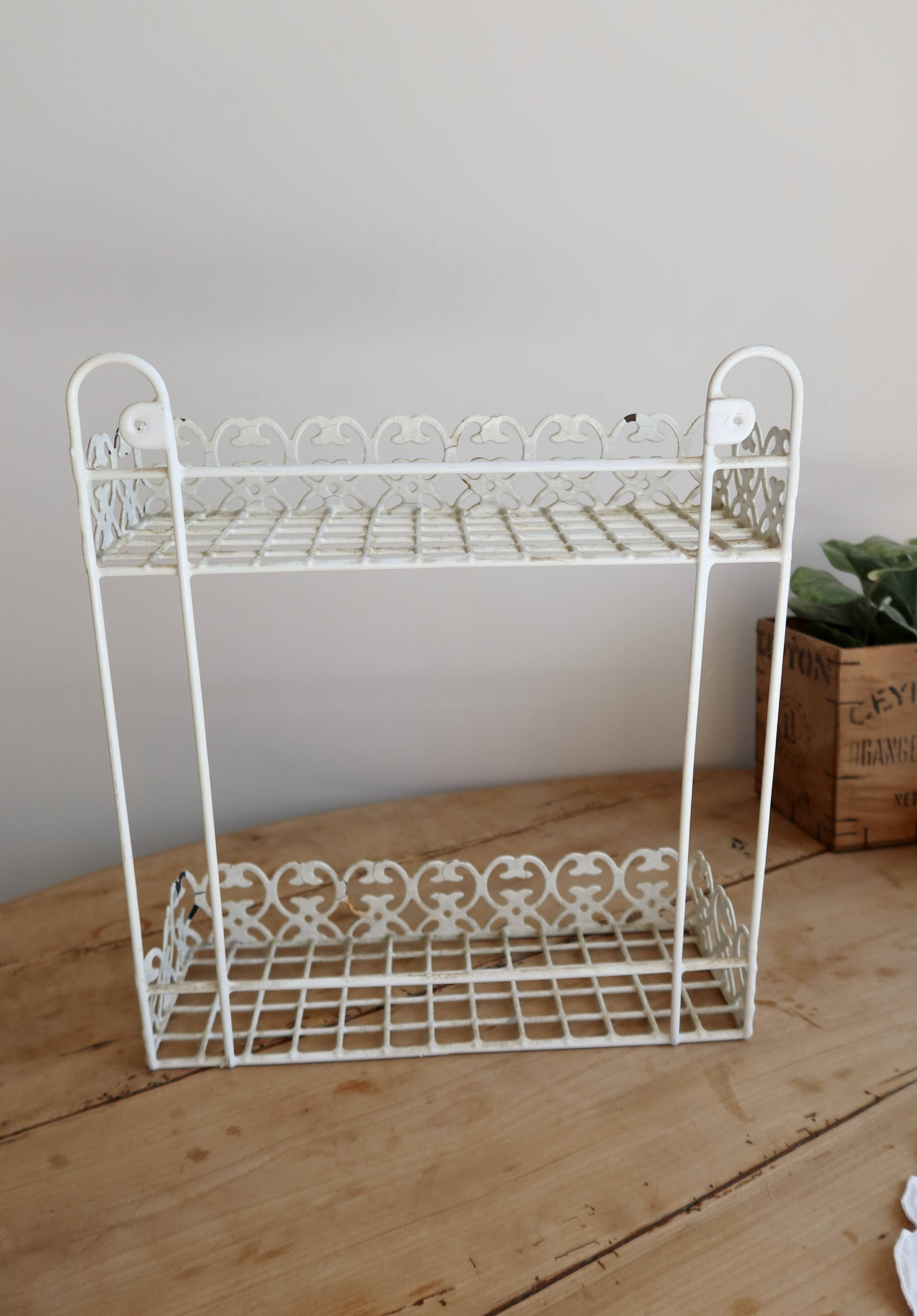 Vintage ivory patinated metal wall shelf
