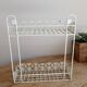 Vintage ivory patinated metal wall shelf