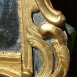 Miroir Louis XV bois doré à parecloses