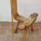 Brutalist chair in solid wood, European handcrafted work from the early 20th century.