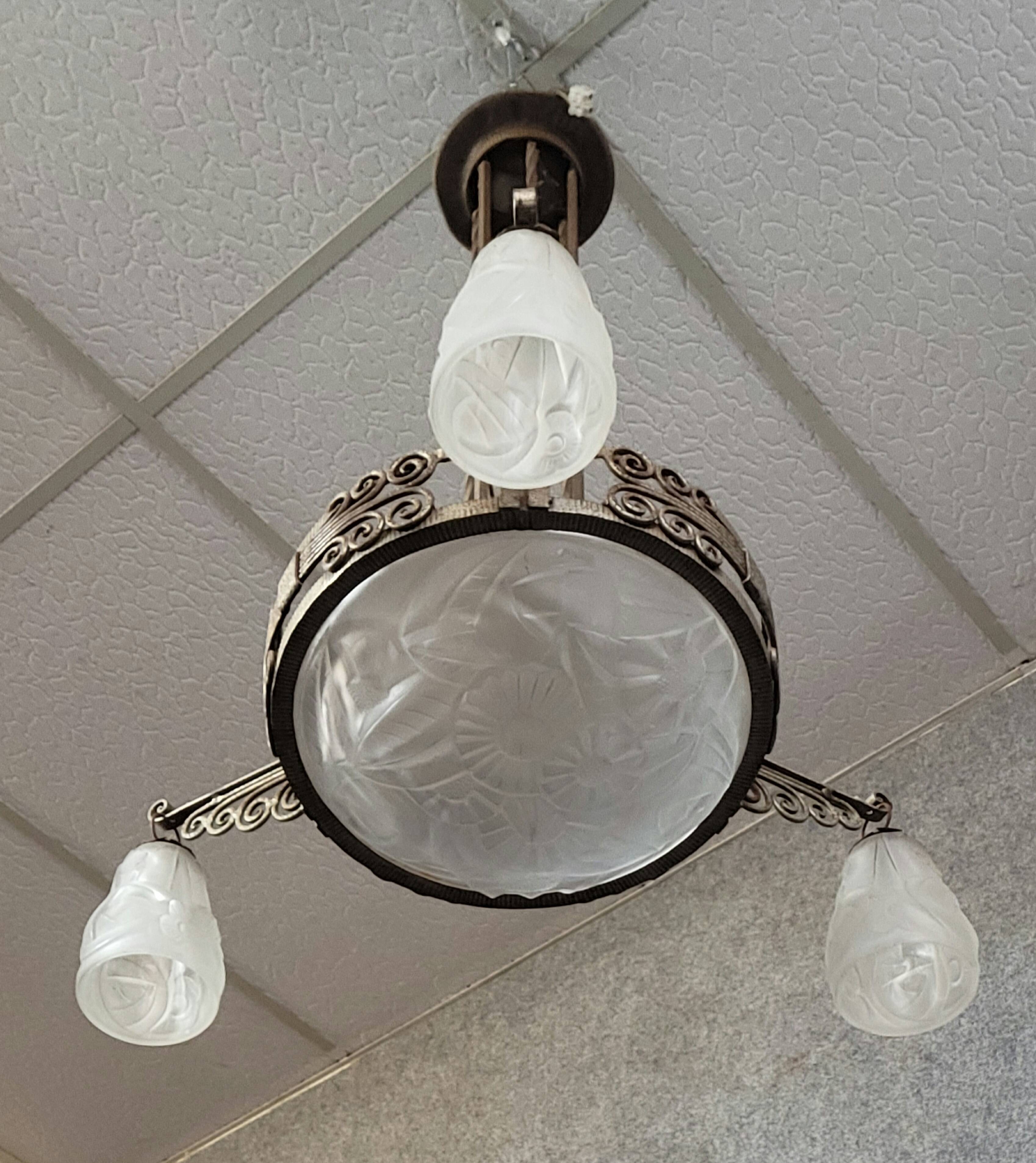 Large Art Deco chandelier, made of finely wrought wrought iron.
