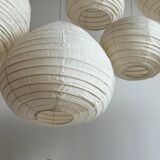 Suspension in rattan and natural japanese linen in the shape of a drop