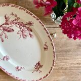 Old oval dish in iron earth