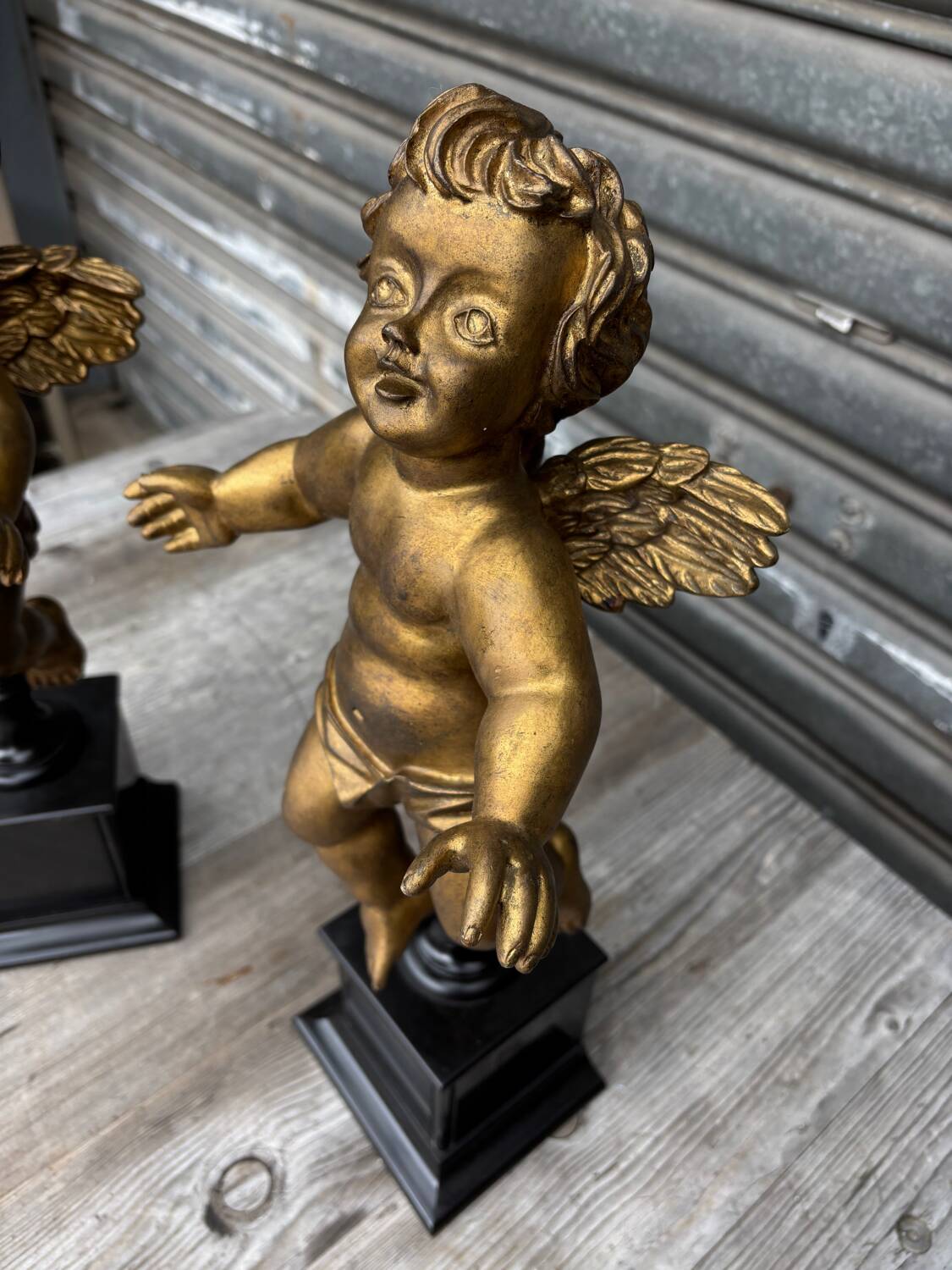 Pair of gilded cherubs on a Napoléon III base