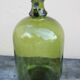 Dame jeanne avec anse vert bouteille