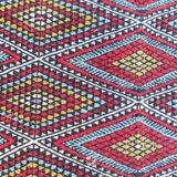 Handmade multicolored diamond patterned kilim rug in natural wool