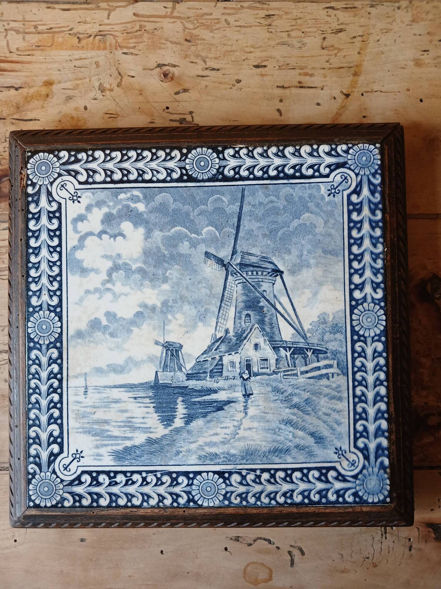 Ceramic tile trivet and wooden frame with Dutch windmill.