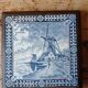 Ceramic tile trivet and wooden frame with Dutch windmill.