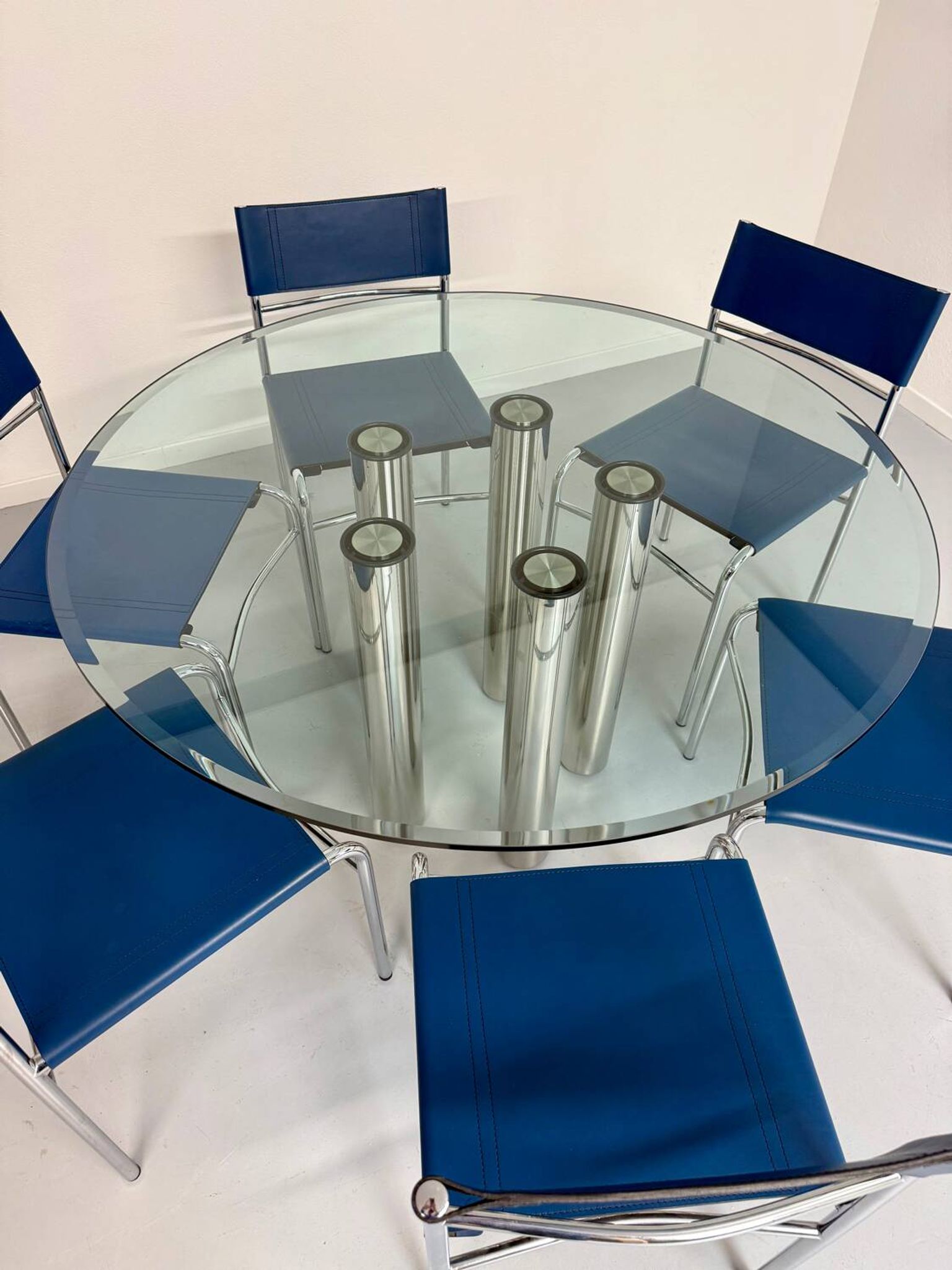 Round glass and metal dining table, Italian design from the 80s, vintage