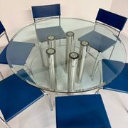 Round glass and metal dining table, Italian design from the 80s, vintage