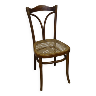 Chaise ancienne en bois courbé et cannage signée Thonet