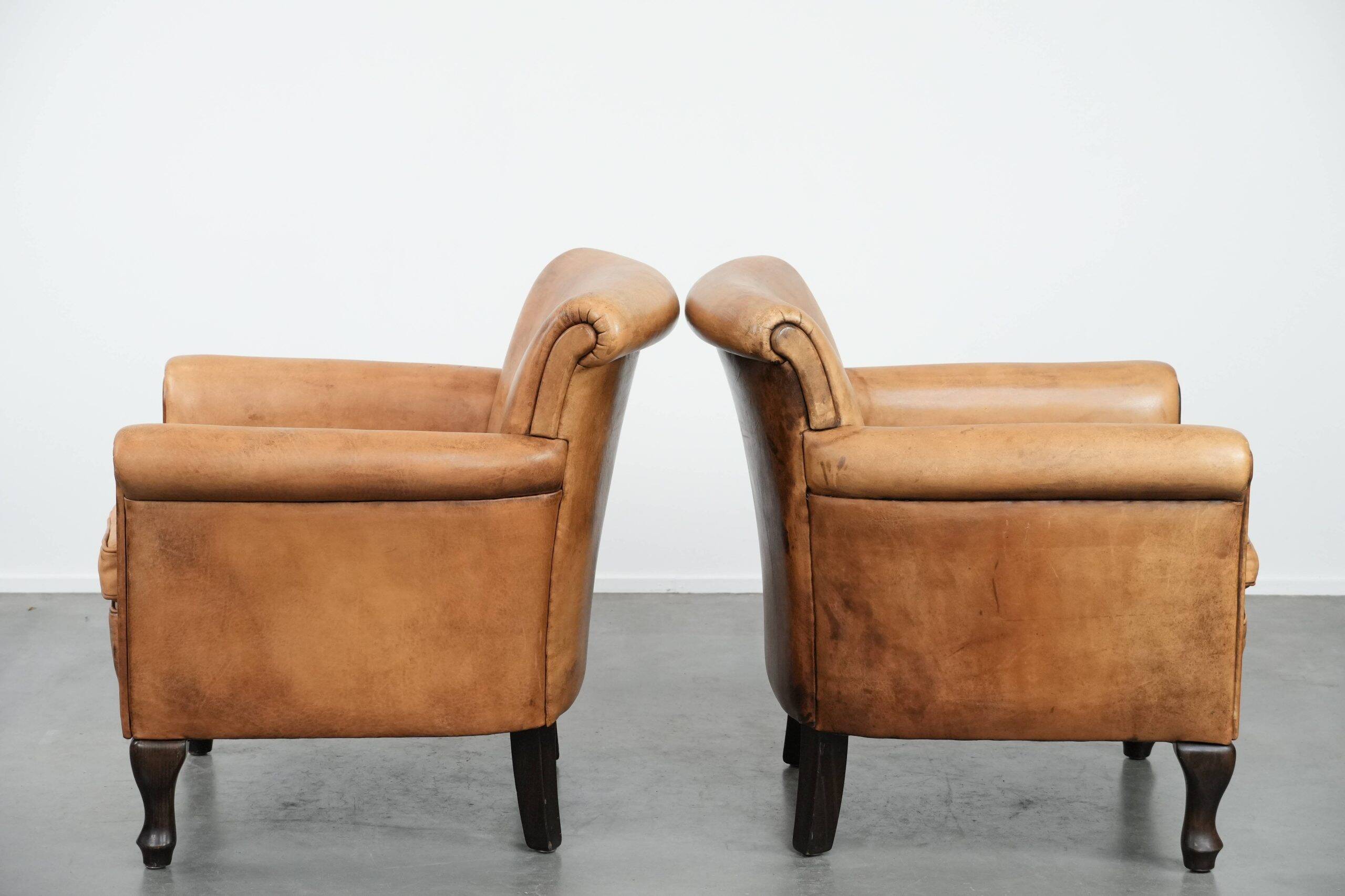 2 fauteuils vintage en cuir de mouton