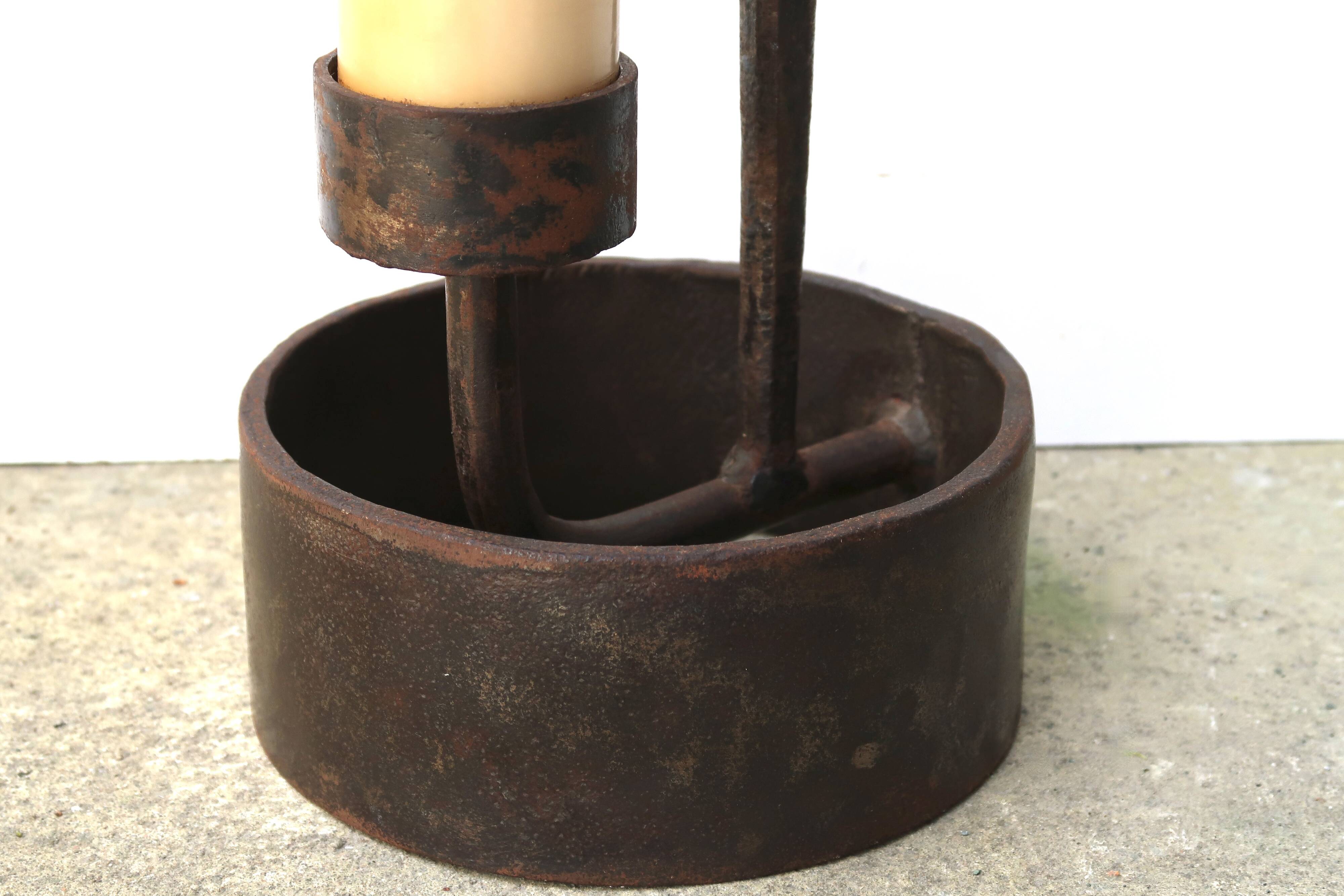 Imposing brutalist wrought iron candlestick "spear", signed, 1950s.