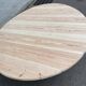 Scandinavian round dining table with a central base, stripped, made of solid raw wood, 90.