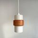 Sputnik pendant light, dark orange ring on white tube