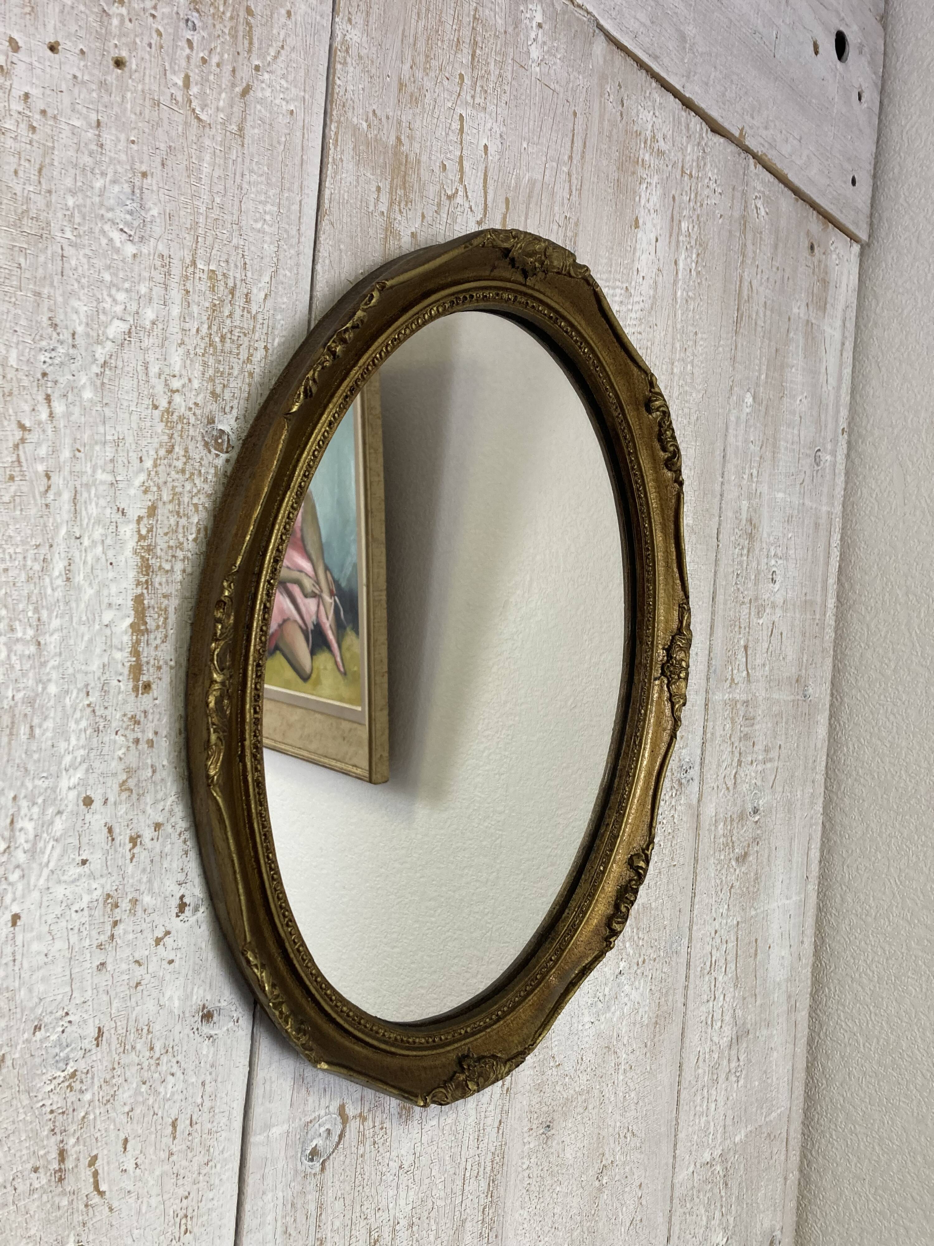 Antique oval mirror