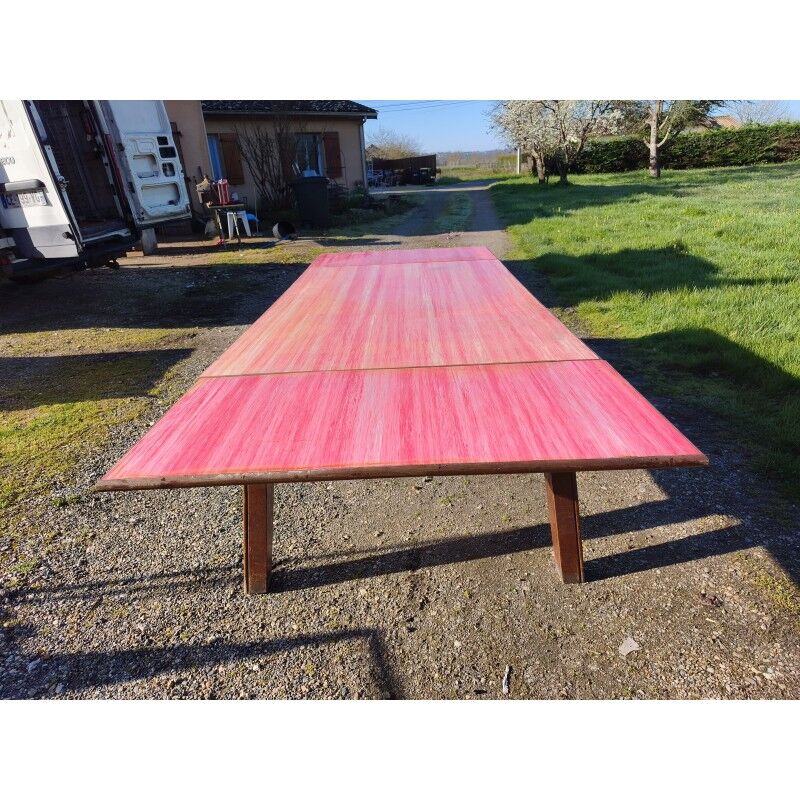 1960s oak dining table with integrated extensions.