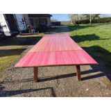1960s oak dining table with integrated extensions.