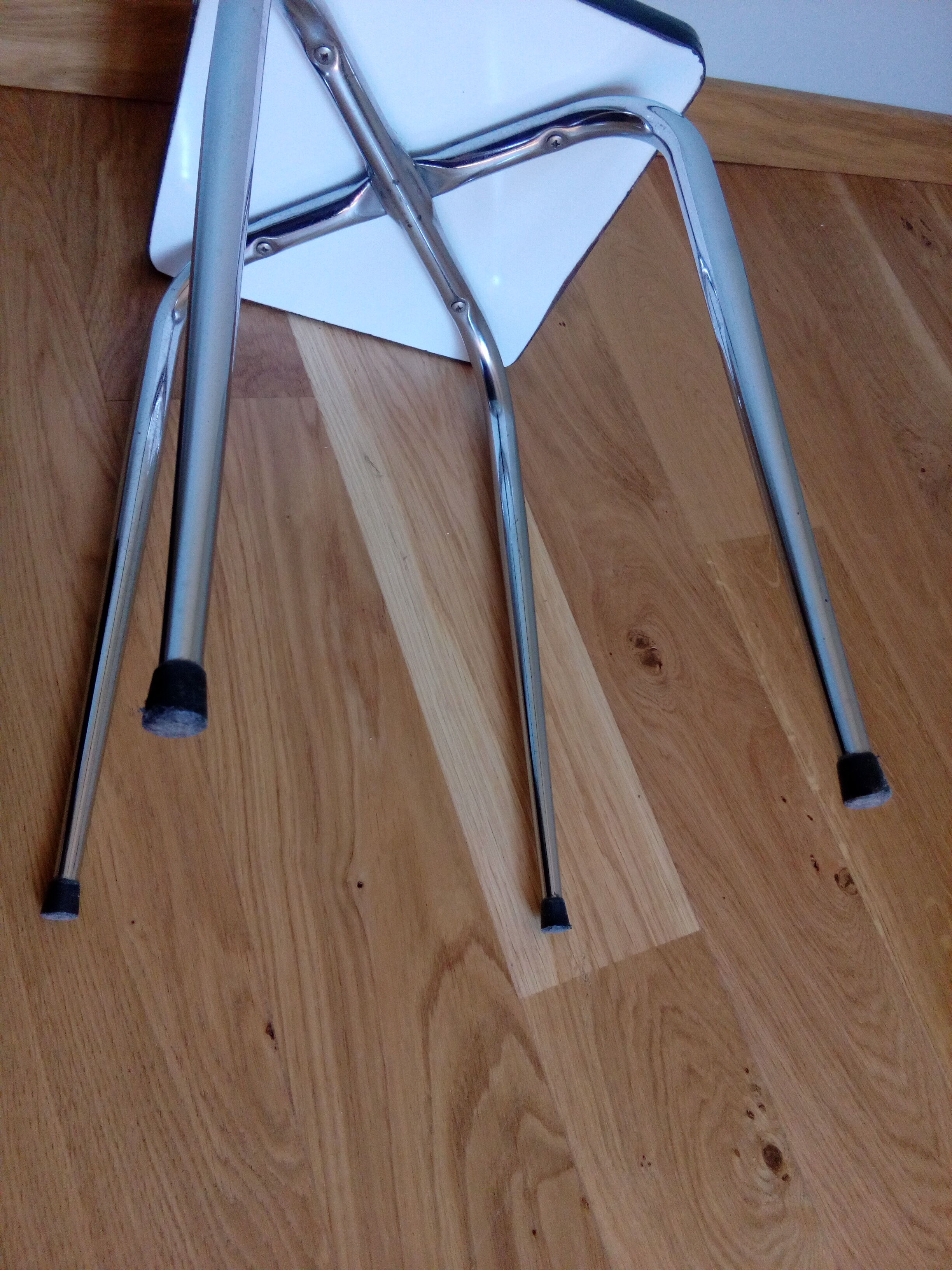 Yellow formica and chrome metal barstool