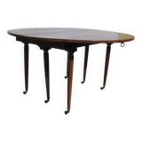 Round table with 6 spindle legs in mahogany, extendable