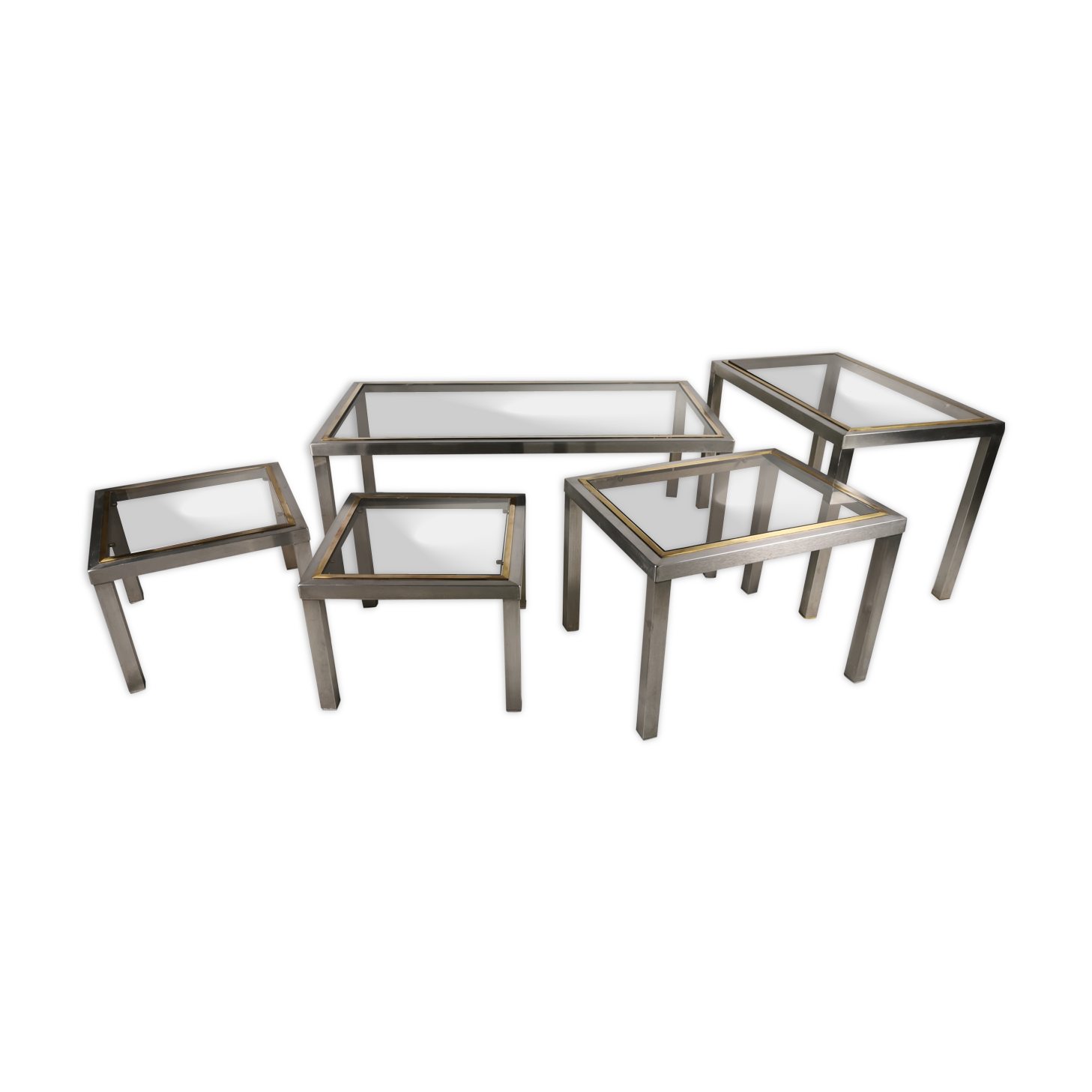 Suite of 5 coffee tables in chrome metal, brass, smoked glass. around 1970