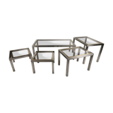 Suite of 5 coffee tables in chrome metal, brass, smoked glass. around 1970