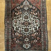 Antique handmade Hamadan Persian rug, ivory medallion on dark background 148x103.