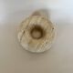 Donut-shaped disguised pocket emptier