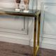 Golden and chrome metal console, bevelled glass, circa 1980.