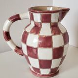 Old ceramic pitcher pattern checkerboard tiles