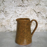 Milk pitcher in spotted sandstone