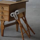 Pair of Danish mid-century folding stools with sheepskin upholstery, 1960.