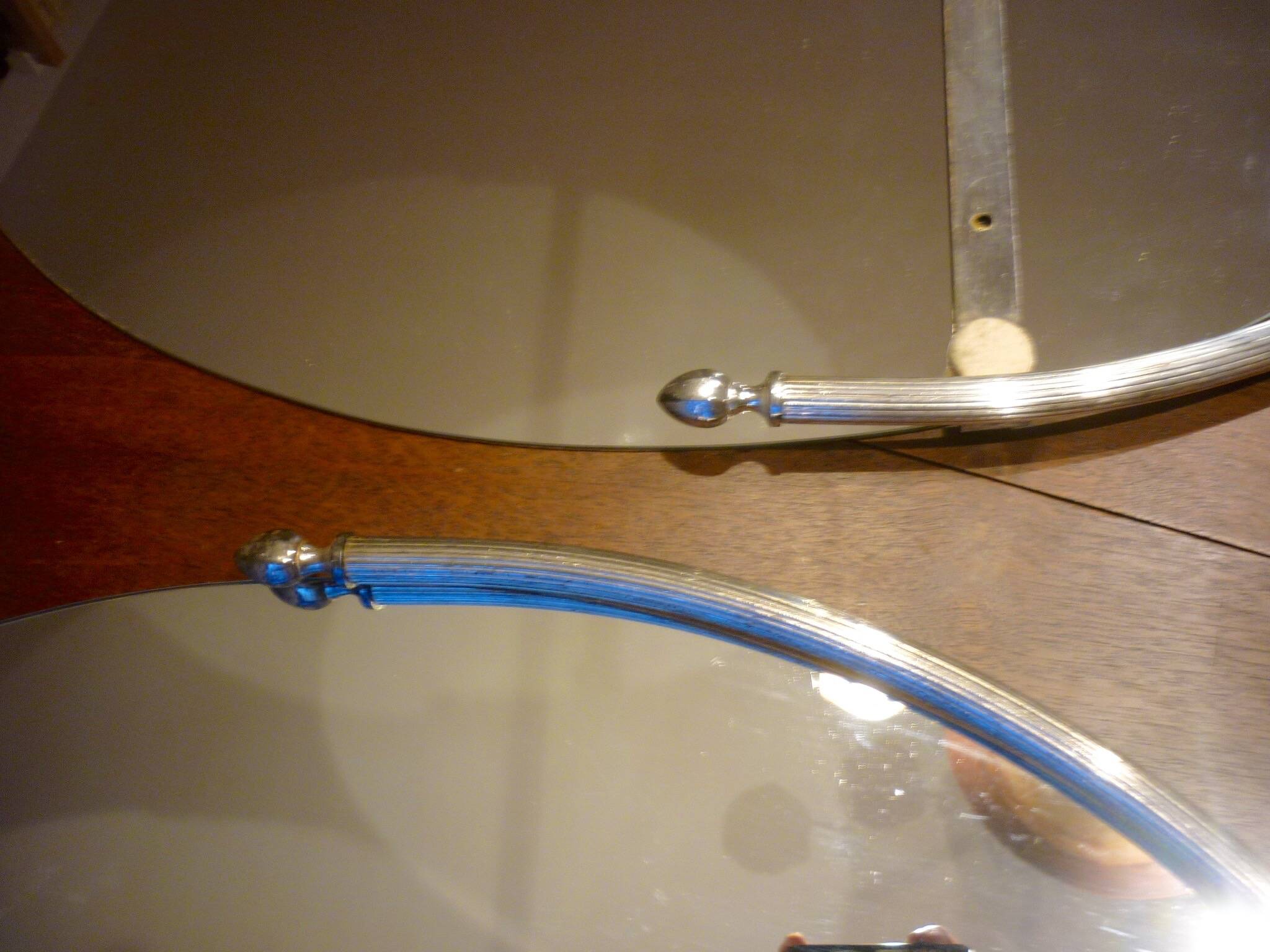 2 bathroom mirrors in silver oval holders