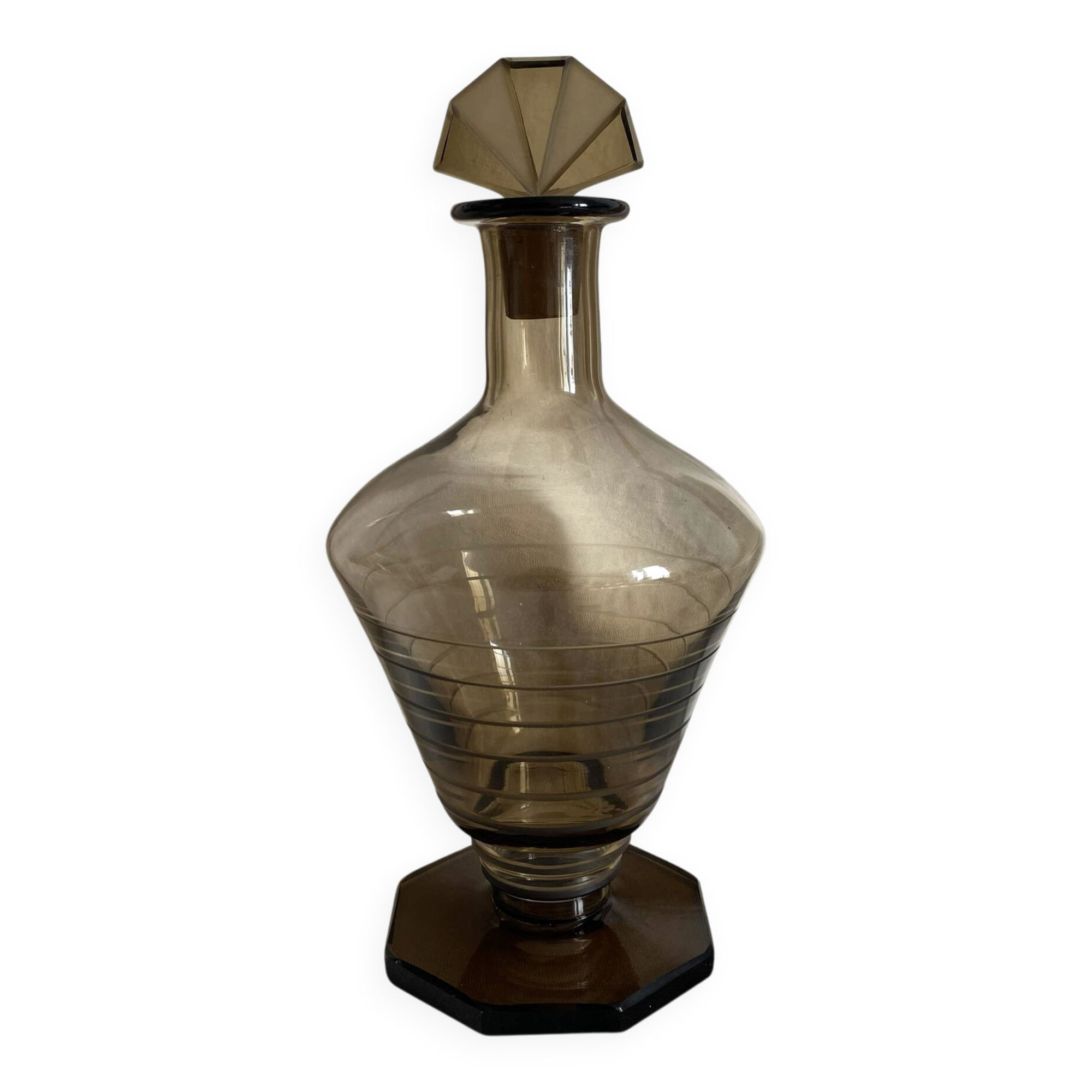 Art Deco smoked glass carafe with fan-shaped stopper.