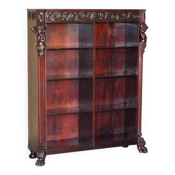 Hand-carved library circa 1900 in hardwood with Hermes statues.
