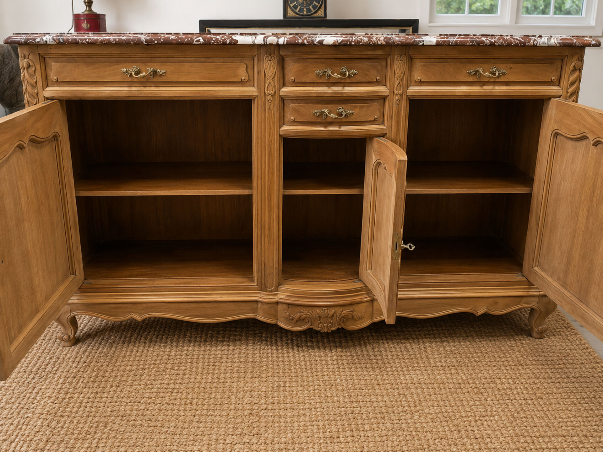 Curved walnut sideboard