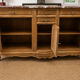 Curved walnut sideboard