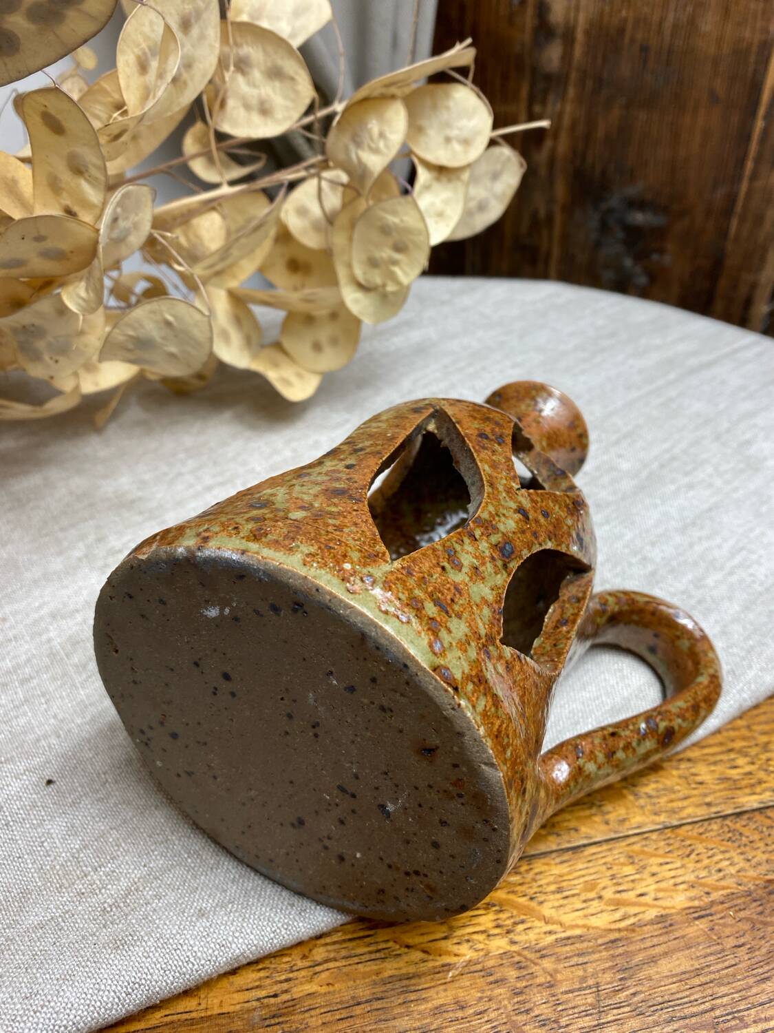 Lantern-style candlestick in pyrite sandstone