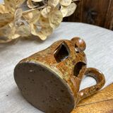 Lantern-style candlestick in pyrite sandstone