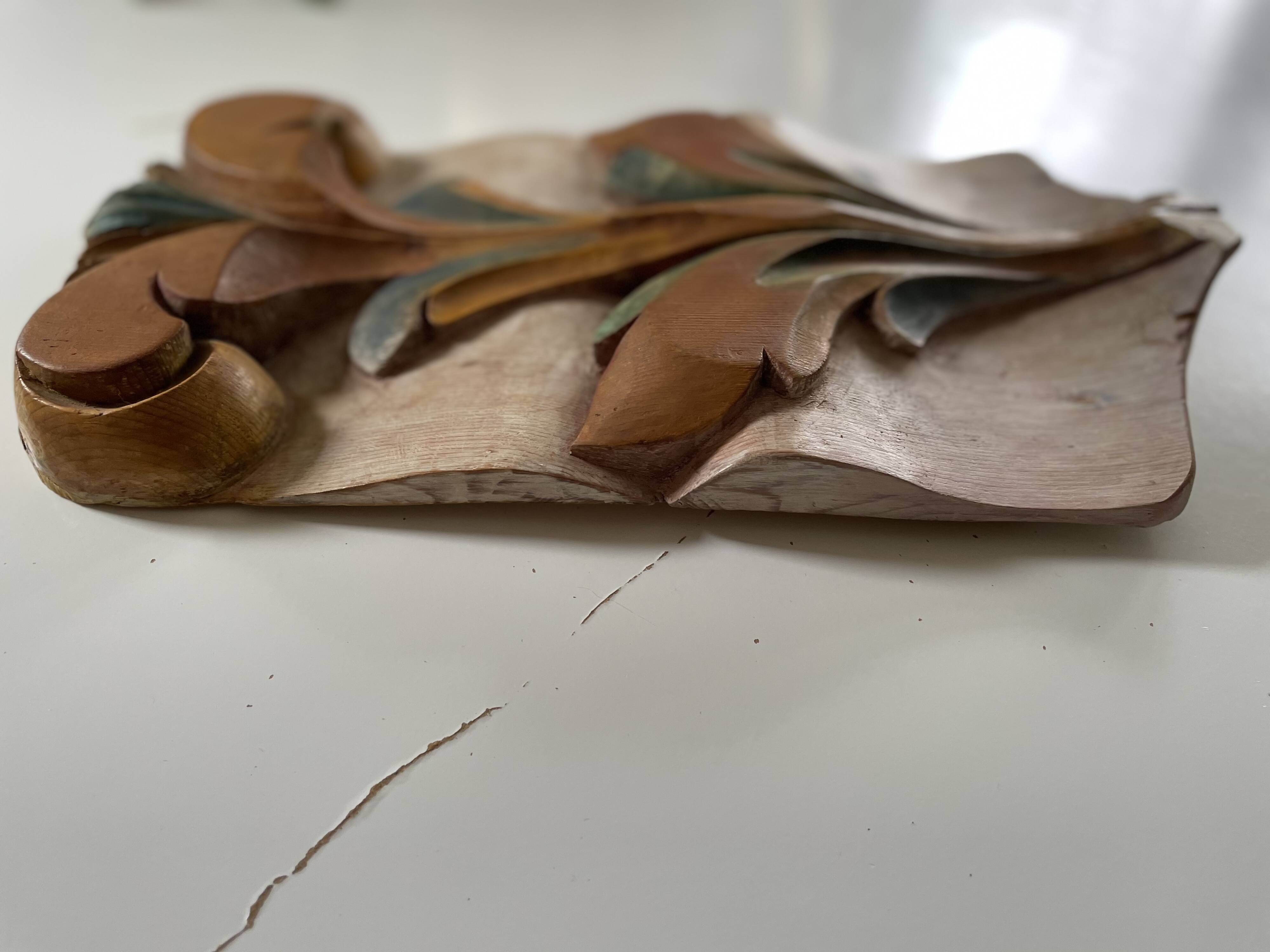 Panneau ancien en bois sculpté au décor de feuillage