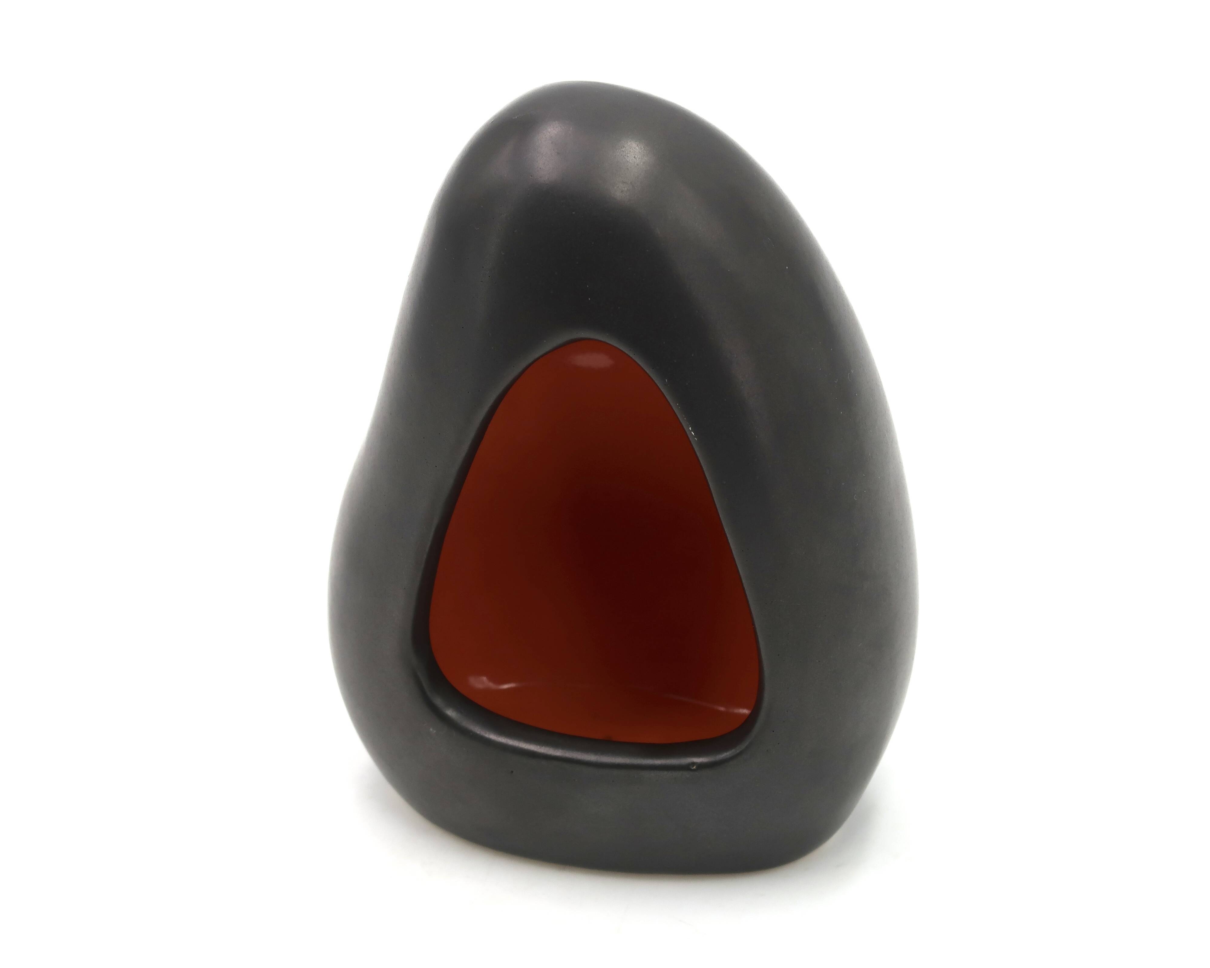 Free-form black signed candle holder, 1960s