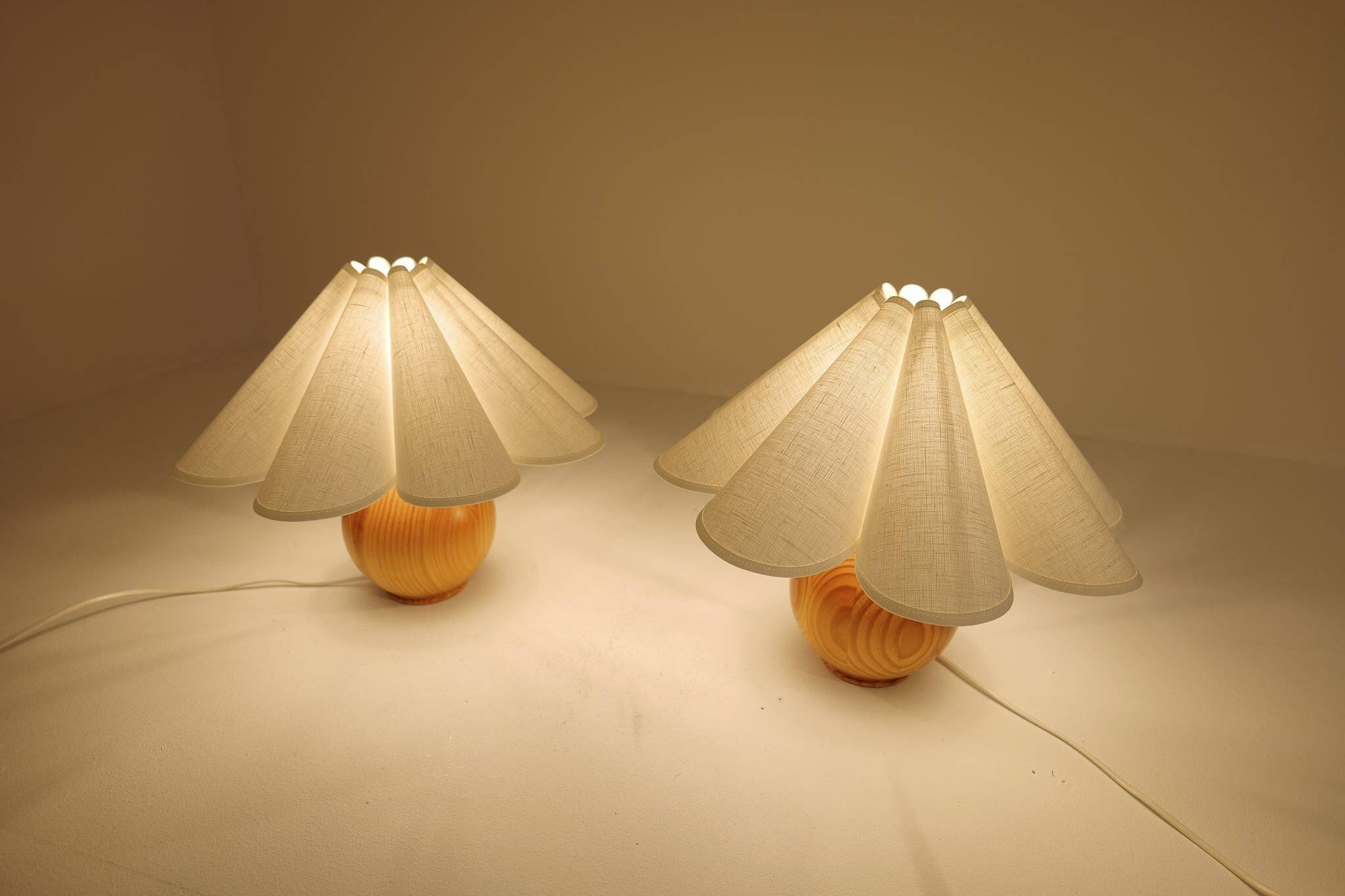 Sculptural modern table lamps from the mid-century in solid pine, Sweden, 1970s.