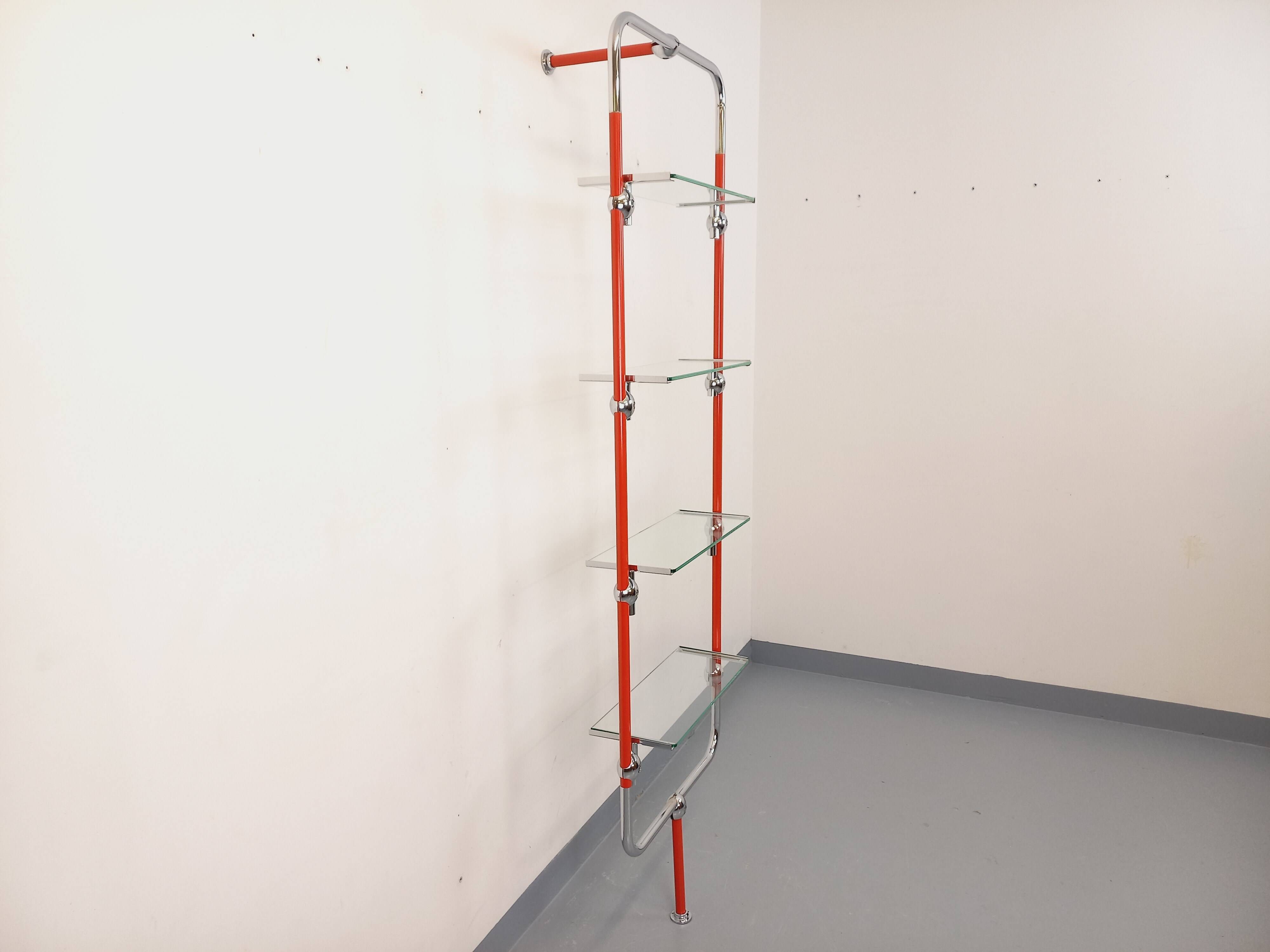 Modular bookshelf in vintage Bauhaus style, red metal, chrome.