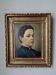 Oil on canvas portrait in an antique gilded wooden frame.