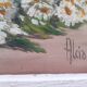 Vintage still life painting with daisies