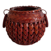 Japanese vase made of woven bamboo. Ikebana.