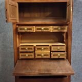 Rare Biedermeier guillotine secretary, made of walnut and marquetry.