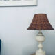Large turned white wooden lamp