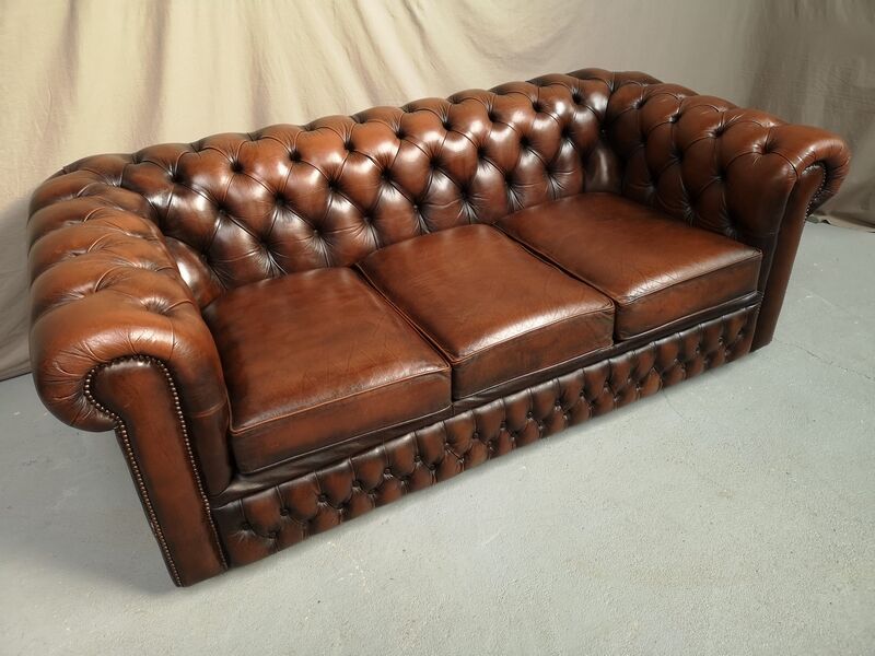 Brown leather chesterfield sofa